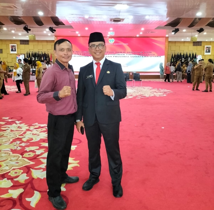 Foto Bersama Kadis Perhubungan Sumut Dr Agustinus Panjaitan dengan Pimpinan Redaksi DETEKSI.co Irwan Ginting, SH di di PRSU.