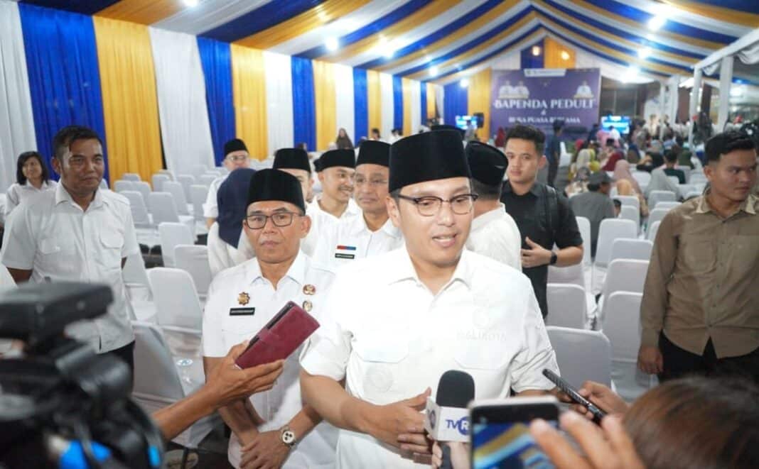 Wali Kota Medan Rico Tri Putra Bayu Waas menghadiri acara Bapenda Peduli dan buka puasa bersama di Kantor Bapenda Kota Medan, Rabu (4/3/2026), sekaligus mendorong digitalisasi pembayaran pajak daerah untuk meningkatkan PAD Kota Medan.