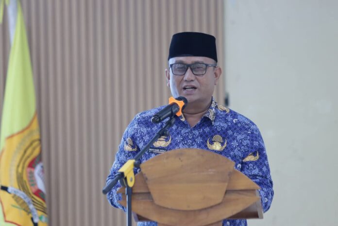 Wakil Bupati Dairi, Wahyu Daniel Sagala menyampaikan sambutan dalam pelantikan Pengcab Wushu, Jumat (17/4/2026). Disampaikan, Pemkab Dairi berkomitmen mendukung pengembangan olahraga sebagai bagian dari pembangunan sumber daya manusia. (Istimewa)