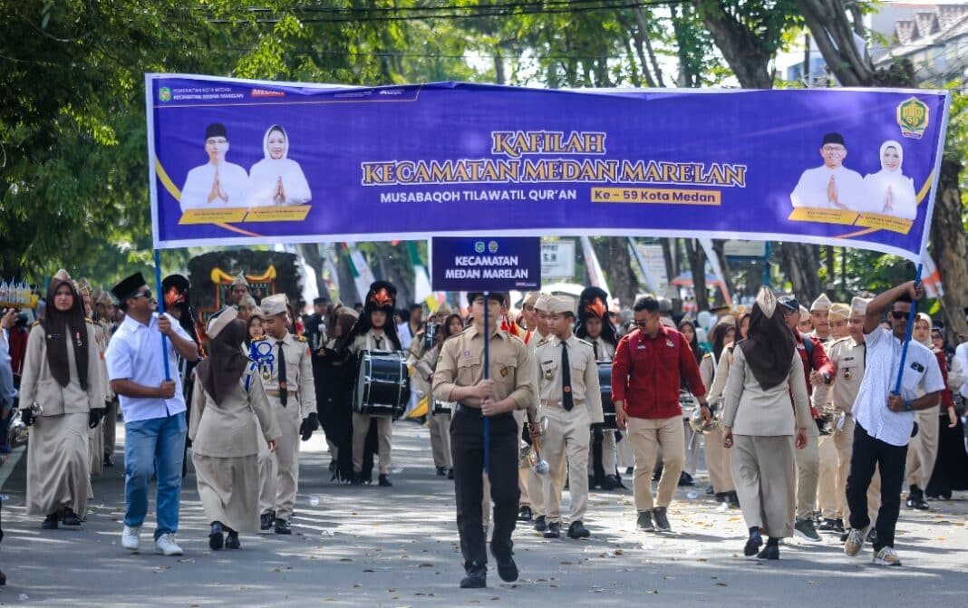 Ribuan kafilah dari 21 kecamatan se-Kota Medan mengikuti Pawai Ta’aruf MTQ ke-59 di Jalan Gatot Subroto, Sabtu (11/4/2026). Pawai berlangsung meriah dengan penampilan busana islami, atraksi budaya, dan marching band yang mencerminkan keberagaman serta semangat syiar Islam di Kota Medan.
