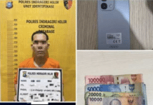 Togel Tembilahan Terbongkar! Polisi Tangkap Pelaku di Pasar Dayang Suri Tersangka kasus perjudian togel diamankan petugas Satreskrim Polres Indragiri Hilir bersama barang bukti berupa handphone, uang tunai, dan riwayat pemasangan nomor togel saat penangkapan di Tembilahan.