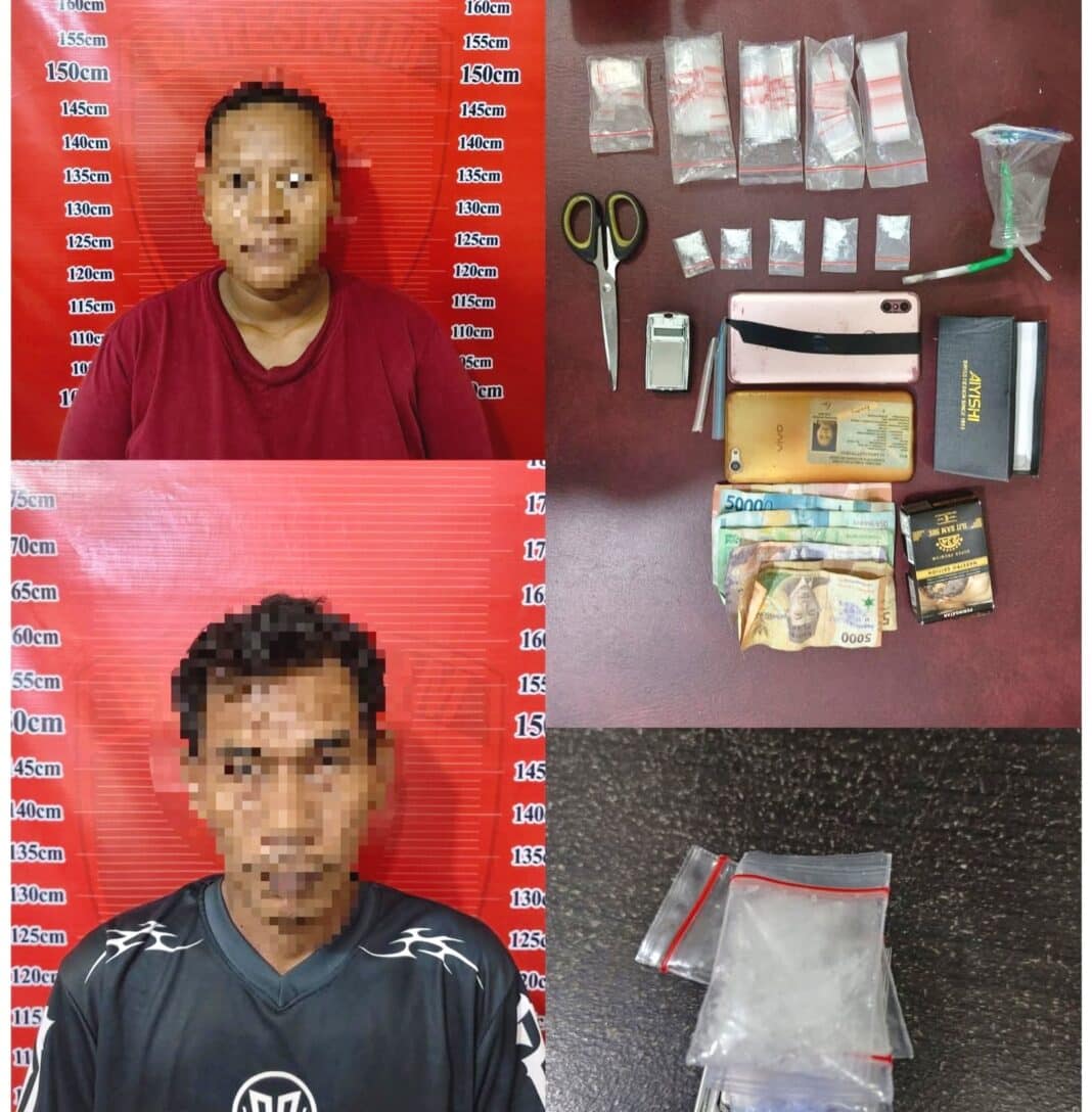 Personel Satres Narkoba Polres Sergai memperlihatkan dua tersangka pasangan suami istri beserta barang bukti sabu saat diamankan di Mapolres Sergai, Minggu (17/5). Pasutri tersebut ditangkap di sebuah lesehan di Desa Pantai Cermin Kiri, Kecamatan Pantai Cermin, karena diduga menjalankan bisnis narkotika jenis sabu.